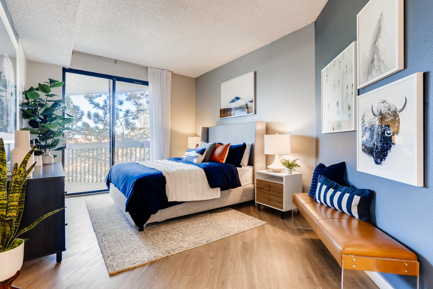 Bedroom with large windows and balcony