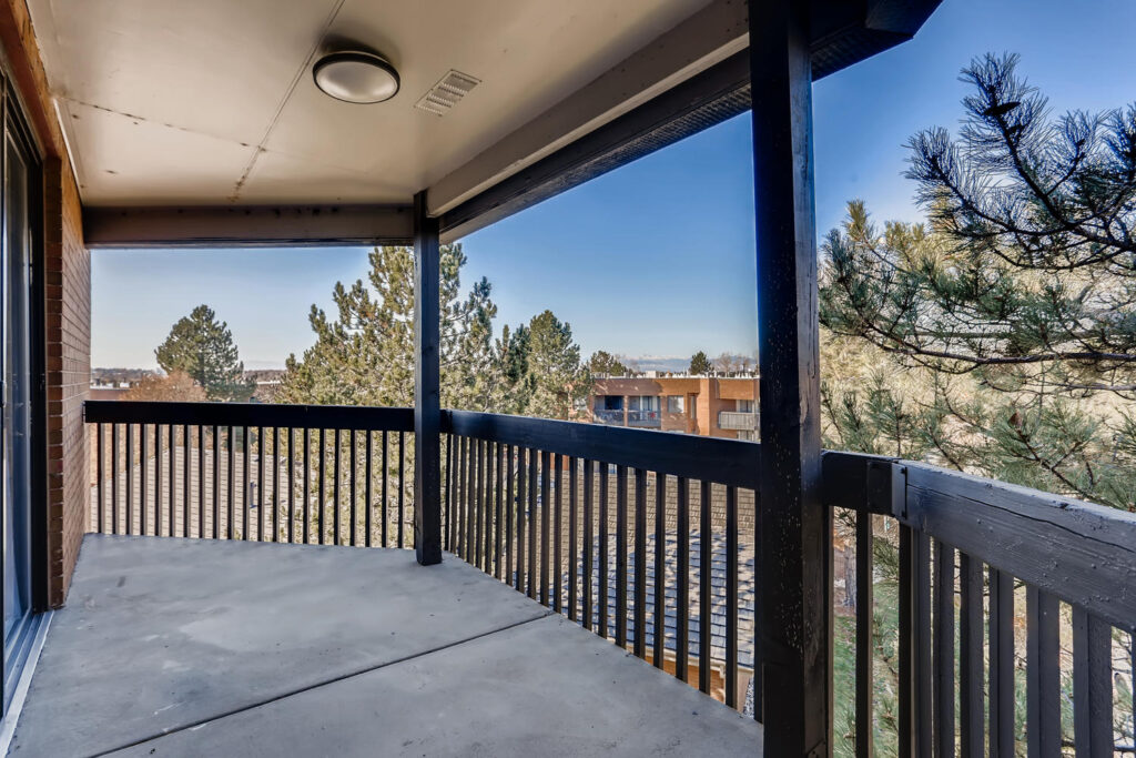 View from a balcony looking over trees